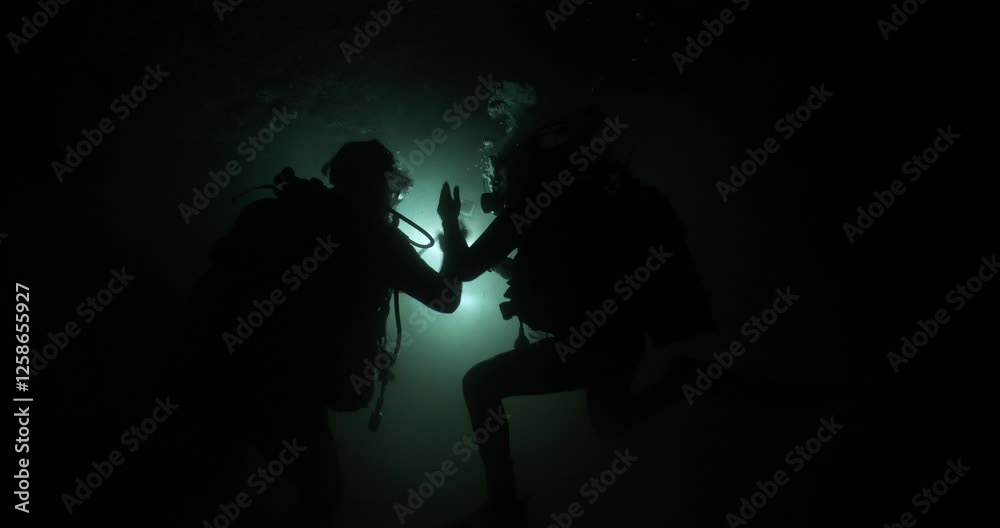 cave diving underwater scuba divers exploring caves, ocean scenery nice blue light color cave diving underwater scuba divers exploring caves, ocean scenery nice blue light color