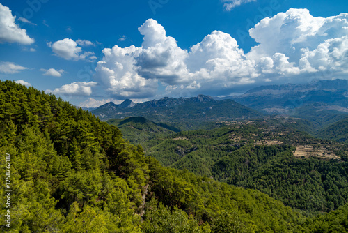 Panoramic view of mountains and beautiful clouds  not far from Tazi canyon ,  Antalya Turkey.  Popular tourist attraction. photo