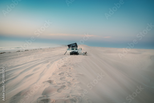 Oman white sand beach dunes camping site
