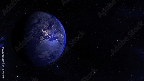 Planet Earth view from space, countries borders highlighted and bright blue glow around the planet with a starry dark blue background. 4K