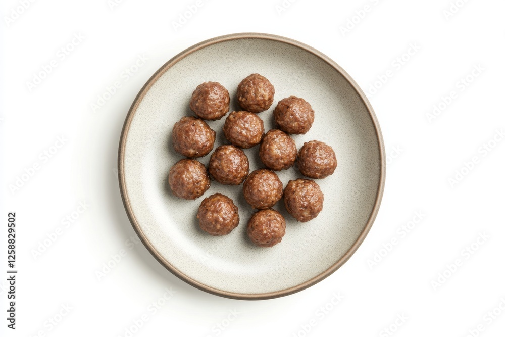 Studio shot of meatballs on plate, white background Studio shot of meatballs on plate, white background