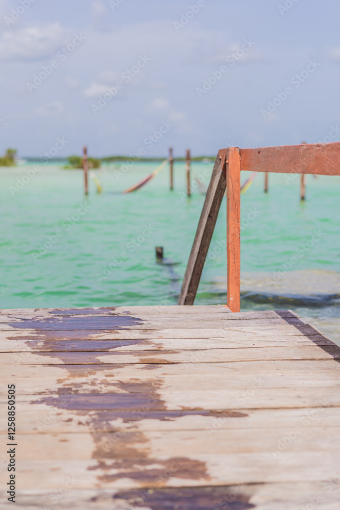 Turquoise waters of Bacalar Lake, Mexico. Peaceful and scenic tropical destination. Travel, relaxation, and nature concept Turquoise waters of Bacalar Lake, Mexico. Peaceful and scenic tropical destination. Travel, relaxation, and nature concept