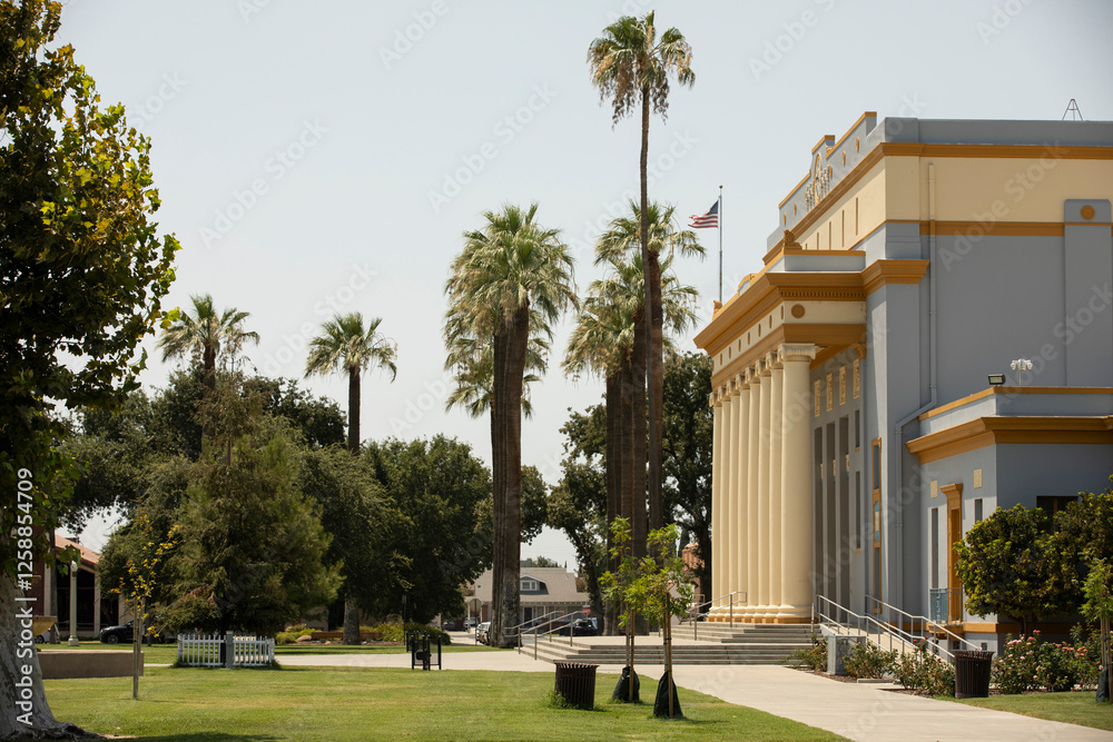Afternoon sun shines on historic buildings of downtown Hanford, California, USA.