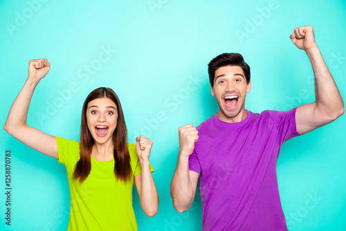 Portrait of his he her she nice attractive glad cheerful cheery couple celebrating crazy spring sale discount good news isolated over bright vivid shine vibrant green blue turquoise background