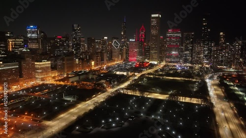 Night Downtown Chicago At Chicago Illinois United States. Amazing Skysrapers And Traffic On Street Viewed From Above. Building Sky Background Illuminated Urban. Town Outdoors Downtown Panoramic City. photo