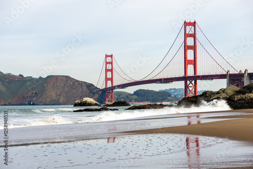 Beautiful Golden Gate Bridgeand its reflectionin water photo