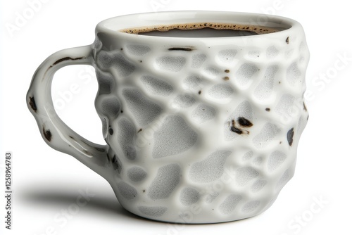 A white ceramic coffee cup filled with black coffee is set against a plain background, making it an excellent image for those seeking a morning caffeine hit photo