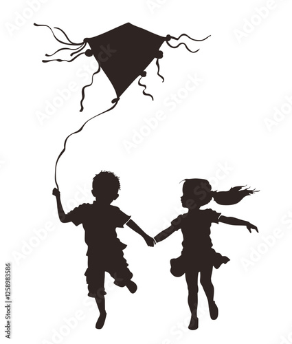 Silhouettes of a boy and a girl playing with a kite outdoors