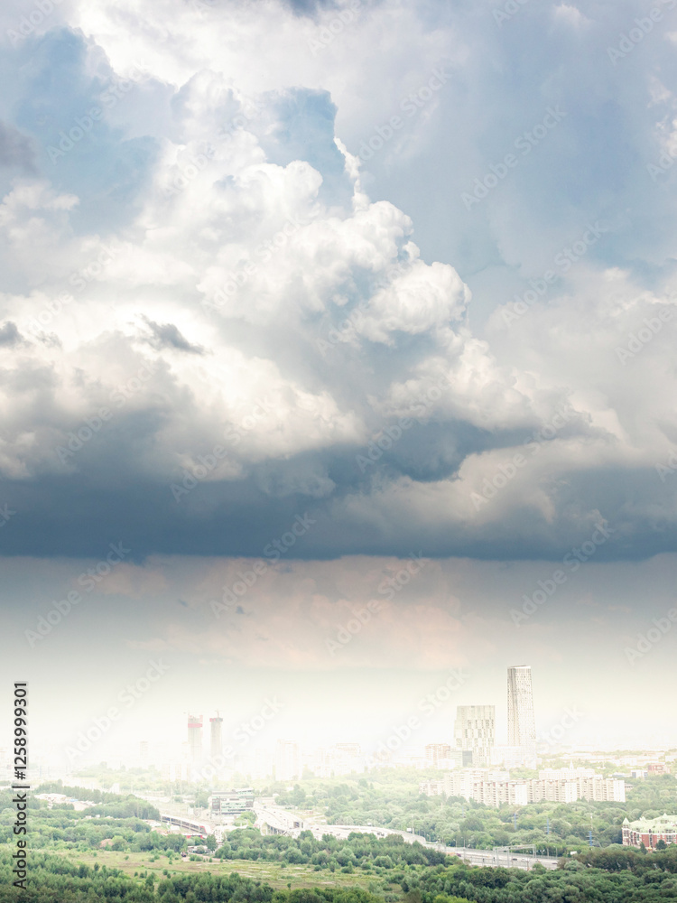 Cloudy sky with a city in the background Cloudy sky with a city in the background