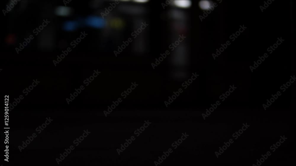 Abstract Motion of Tram in Dark City Lights with Artistic Blur Effects Abstract Motion of Tram in Dark City Lights with Artistic Blur Effects