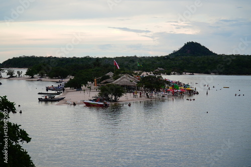Panoramic view of the Tapajos River under a cloudy evening sky. The island of love in Alter do Chão, known as the Caribbean in the middle of the Amazon, state of Pará, Brazil.