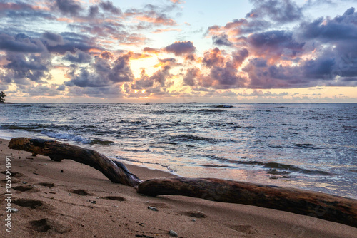 Sunrise Photos from Waipouli Beach in Kapa'a, Kauai captured from different perspectives and lighting conditions photo