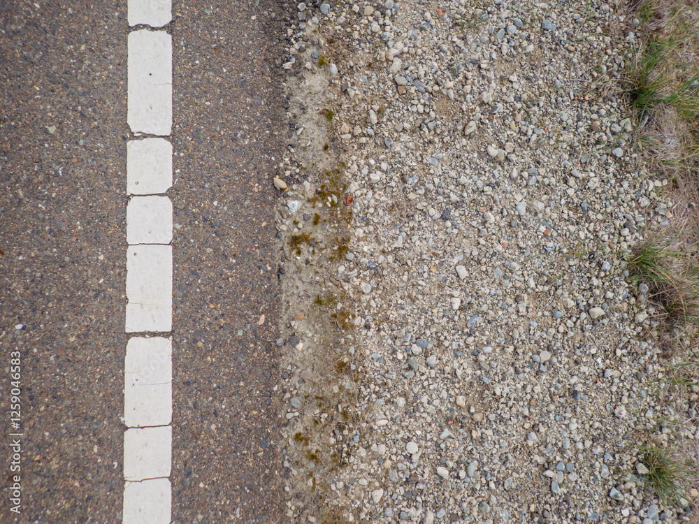 Look down at white line on shoulder of a road Look down at white line on shoulder of a road