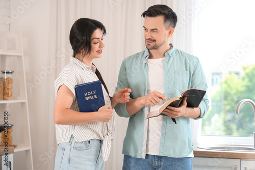 Religious couple reading Ho...