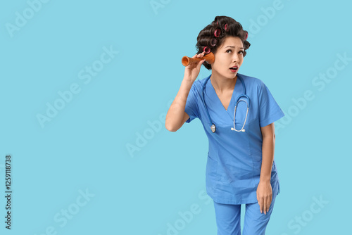 Female Asian doctor with ha...
