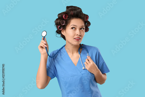 Female Asian doctor with ha...