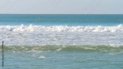 Wallpaper Mural Gentle Ocean Waves Rolling onto a Sandy Beach in Portugal Torontodigital.ca