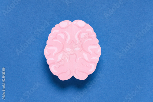 Paper human brain on blue b...