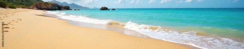 Warm sandy beach with soft blue ocean waves gently lapping at the shore, sand, sun, waves Warm sandy beach with soft blue ocean waves gently lapping at the shore, sand, sun, waves