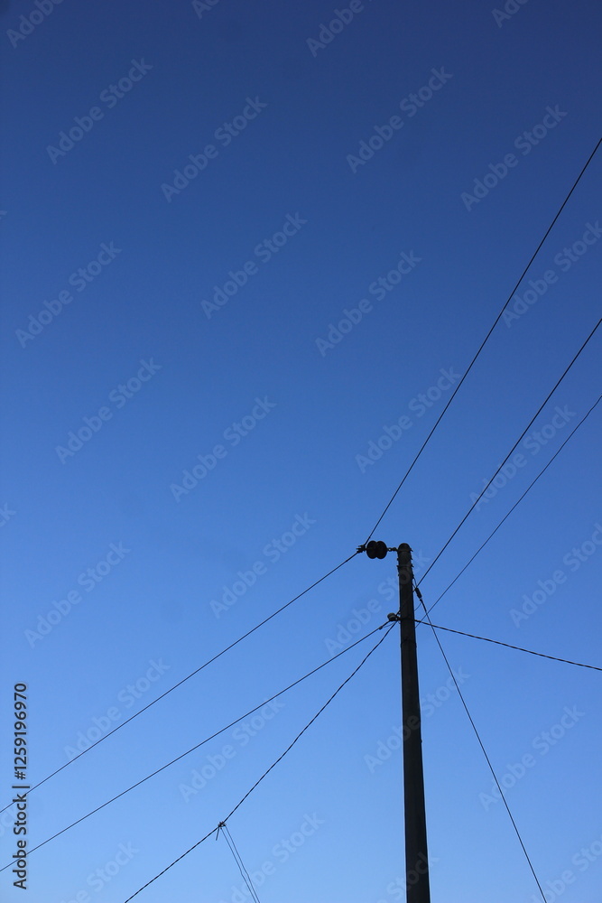 low angle view of electric pole with natural sky background low angle view of electric pole with natural sky background