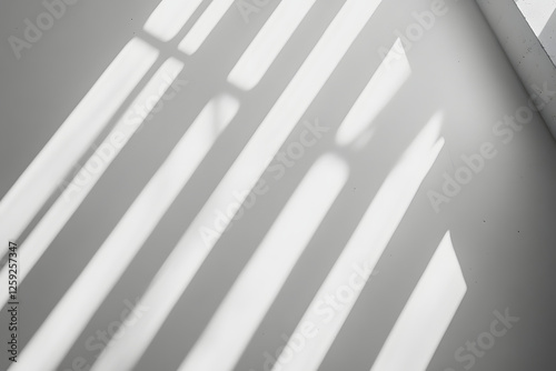 Light and Shadow Patterns on a Grey Surface