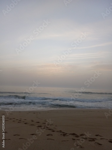 Obraz na płótnie sunset on the beach in portugal w salonie