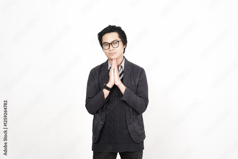 Begging to say sorry Of Handsome Asian Man Isolated On White Background Begging to say sorry Of Handsome Asian Man Isolated On White Background