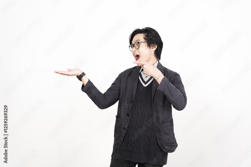 Shocked face Showing and Presenting Product on Open Palm Of Handsome Asian Man Isolated On White Background Shocked face Showing and Presenting Product on Open Palm Of Handsome Asian Man Isolated On White Background