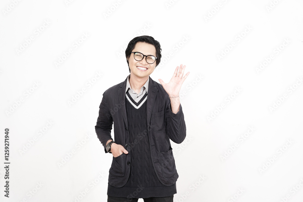 Smile looking at camera wave and say hi or hello Of Handsome Asian Man Isolated On White Background Smile looking at camera wave and say hi or hello Of Handsome Asian Man Isolated On White Background