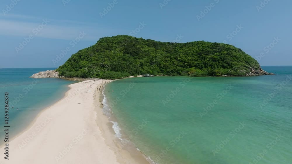 White sandy beach with a green hill surrounded by turquoise waters. Ko Ma Beach. Ko Pha Ngan, Thailand. White sandy beach with a green hill surrounded by turquoise waters. Ko Ma Beach. Ko Pha Ngan, Thailand.
