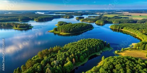 Fototapeta Naklejka Na Ścianę i Meble -  Panoramic aerial view of Lake Mazury in Poland's picturesque region of East Prussia, featuring dense forests and rolling hills surrounding the vast lake, mazury lake, nature scenery