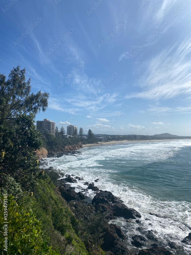 Fototapeta premium coast of the sea with clouds in the sky