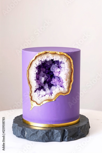 Elegant purple geode cake with crystal sugar decoration and gold detailing.