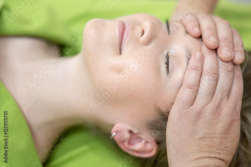 Wallpaper Mural Caucasian woman receiving manual facial massage.  Torontodigital.ca