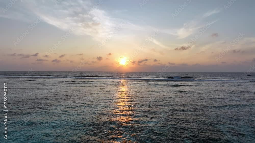 Beautiful view of sunset or sunrise. Summer beach landscape, vacation or tropical trip. Seascapes of the best beaches, soft sand and calm ocean. Beautiful view of sunset or sunrise. Summer beach landscape, vacation or tropical trip. Seascapes of the best beaches, soft sand and calm ocean.