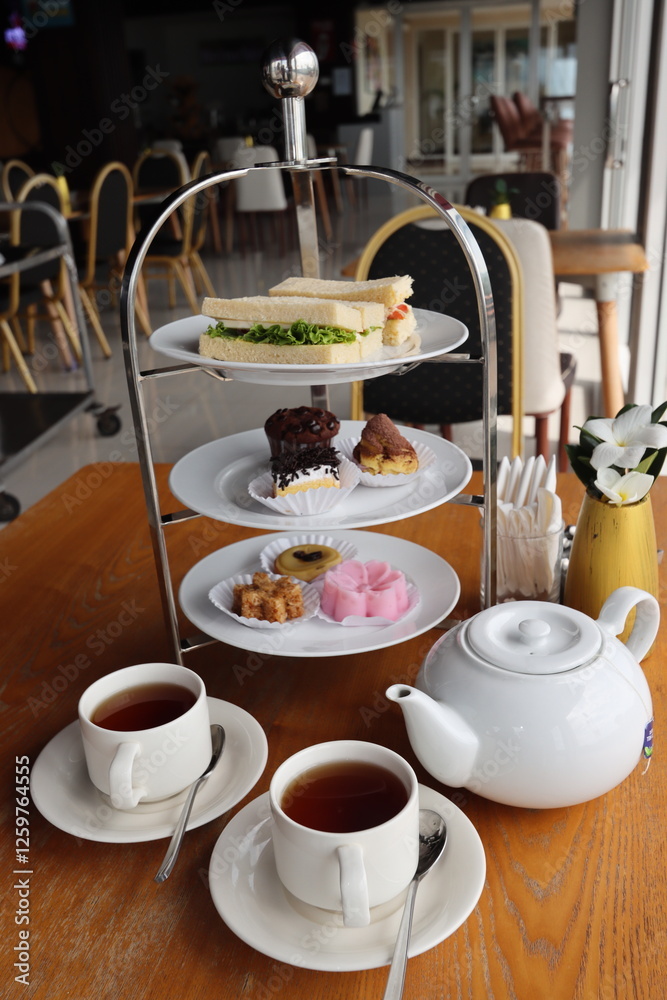Fototapeta premium afternoon hitea tower with various delicious cake
