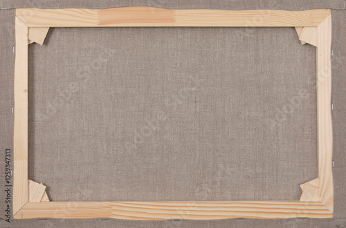 Reverse side of primed linen canvas.