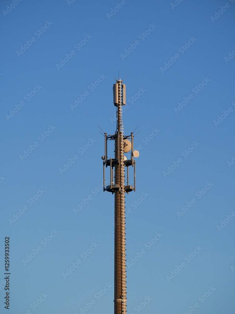 Large cell tower outside the city, visible from afar. Supports network coverage and wireless communication, modern infrastructure for mobile data. Large cell tower outside the city, visible from afar. Supports network coverage and wireless communication, modern infrastructure for mobile data.