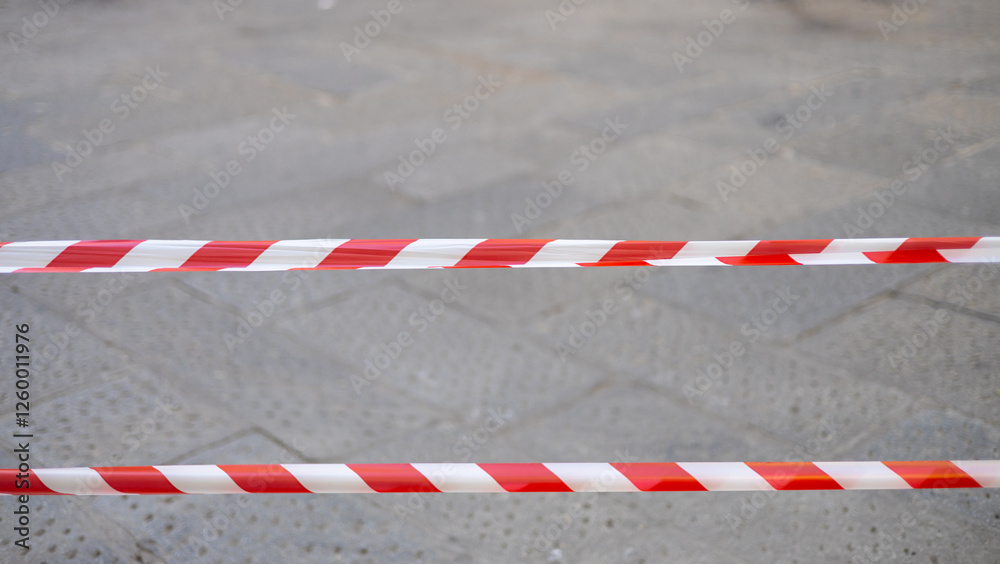Red white signal tape. Warning of danger. No entry banner Red white signal tape. Warning of danger. No entry banner