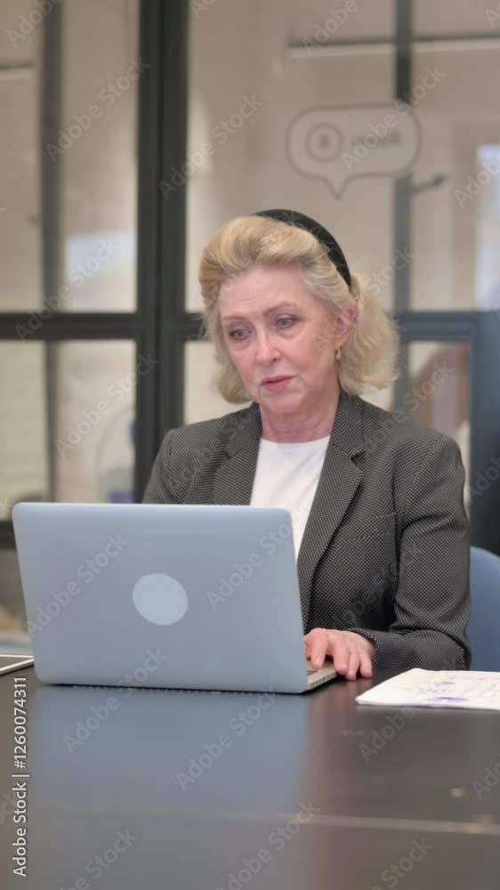 Senior Old Business Woman Doing Video Chat via Laptop, Vertical Video Senior Old Business Woman Doing Video Chat via Laptop, Vertical Video