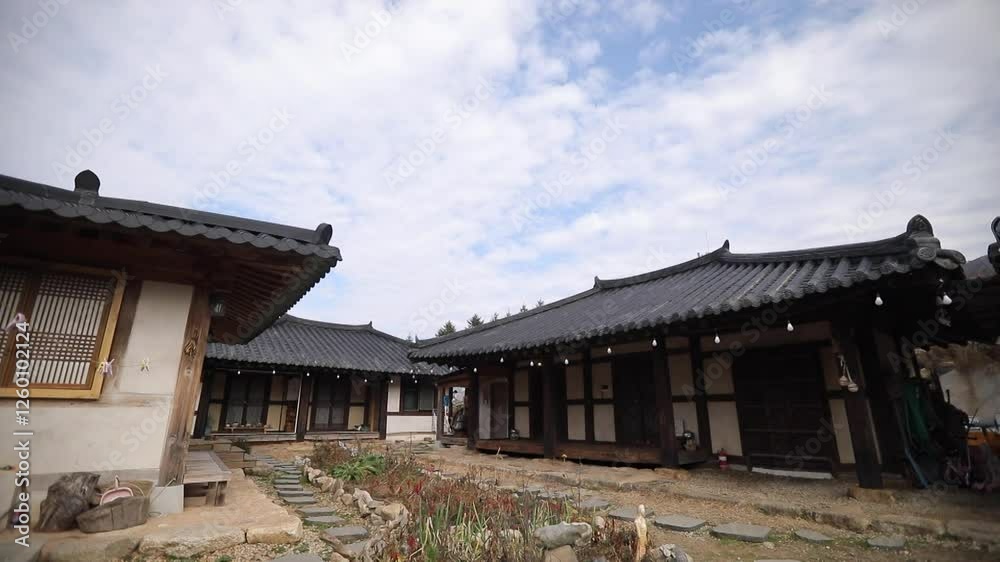 Traditional Korean house under a cloudy sky Traditional Korean house under a cloudy sky