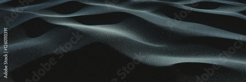 Exploring the unique texture of black sand mixed with fine volcanic dust in a serene landscape