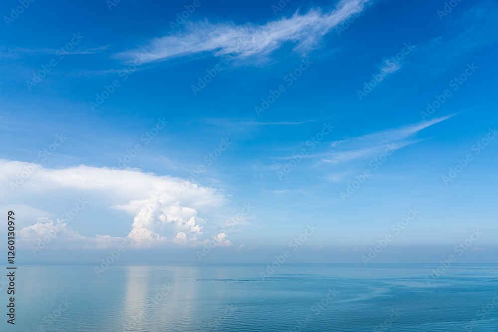 Obraz premium View of blue sky and ocean with white cloud