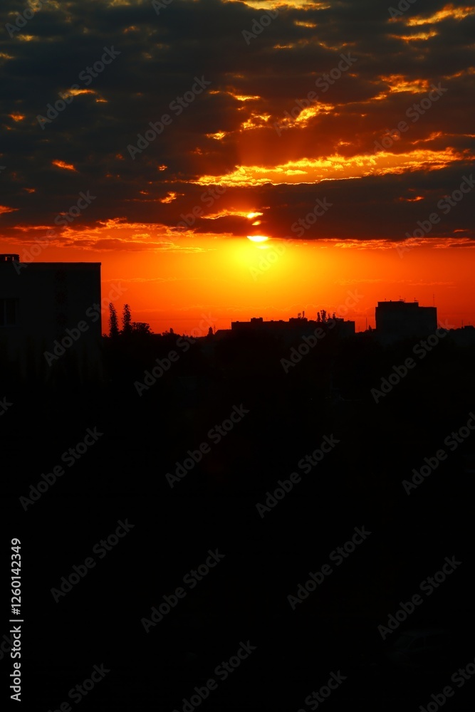 Fototapeta premium City silhouette. Sunrise. Cloudy sky. Красочная фотография. Обложка. Об'ртка. Обои. Фон.