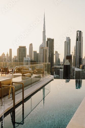 Photography Luxury rooftop pool with a breathtaking view of Dubai's skyline and the iconic B