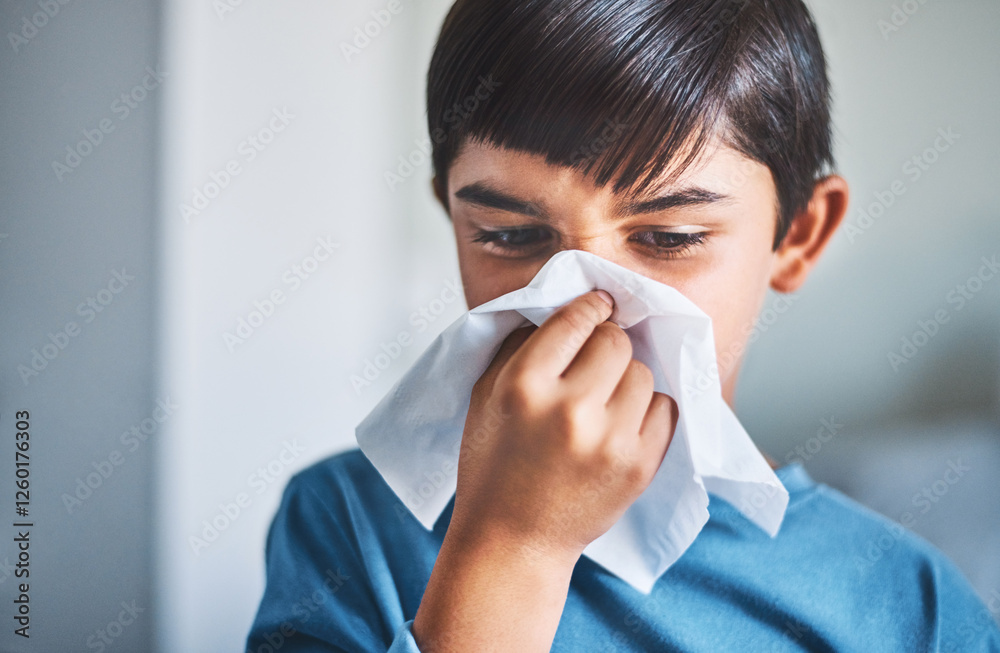 Home, child and blowing with tissue for nose, wellness hygiene and sick with congestion for virus. House, male person and disposal paper product with boy for flu, allergy and infection in apartment Home, child and blowing with tissue for nose, wellness hygiene and sick with congestion for virus. House, male person and disposal paper product with boy for flu, allergy and infection in apartment