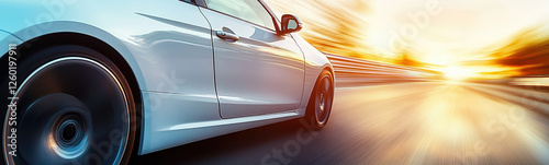 Dynamic Motion of a Sports Car on a Sunset Highway - Perfect for Speed and Adventure Themes