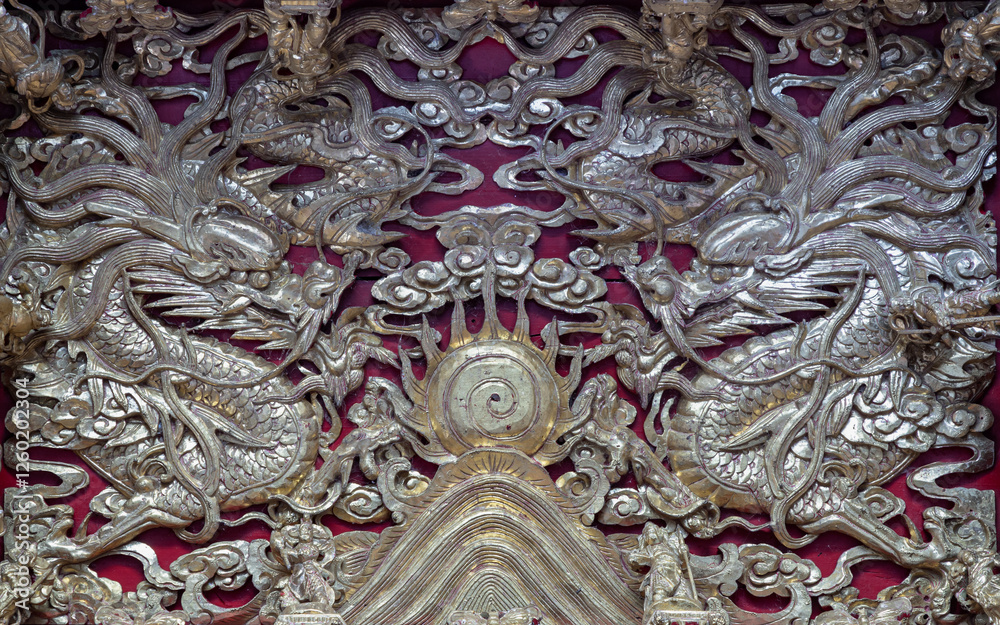 Elaborate sculptures on ceiling design inside the Buddhist temple of Wat Dhammakatanyu (Xian Lo Dai Tien Gong). Taiwanese art style, Look up, use it as your Wallpaper, Poster and Space for text.