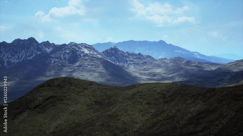 Majestic mountains rise in the background while gentle hills bask in the sunlight. Shadows dance across the landscape, highlighting its vastness and natural beauty. Majestic mountains rise in the background while gentle hills bask in the sunlight. Shadows dance across the landscape, highlighting its vastness and natural beauty.