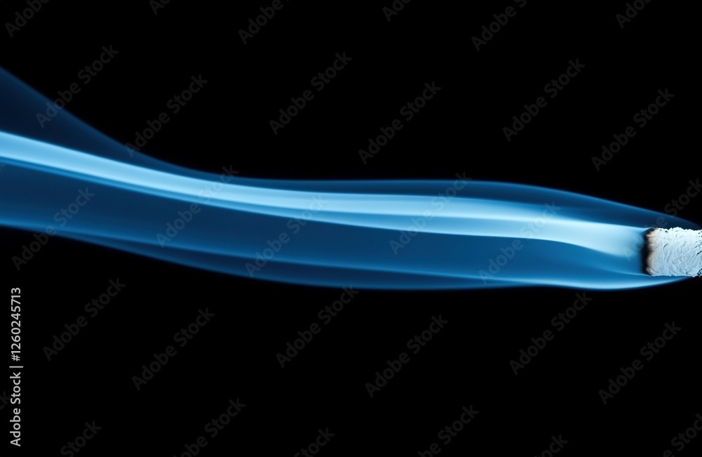 Fototapeta premium Blue smoke trail from a square object on black background